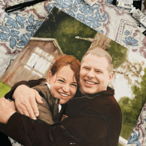Portrait of a happy couple with their first house
